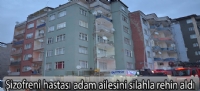Şizofreni hastası adam ailesini silahla rehin aldı