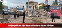 Doğanşehir'de Ağır Hasarlı Binaların Yıkımı Sürüyor